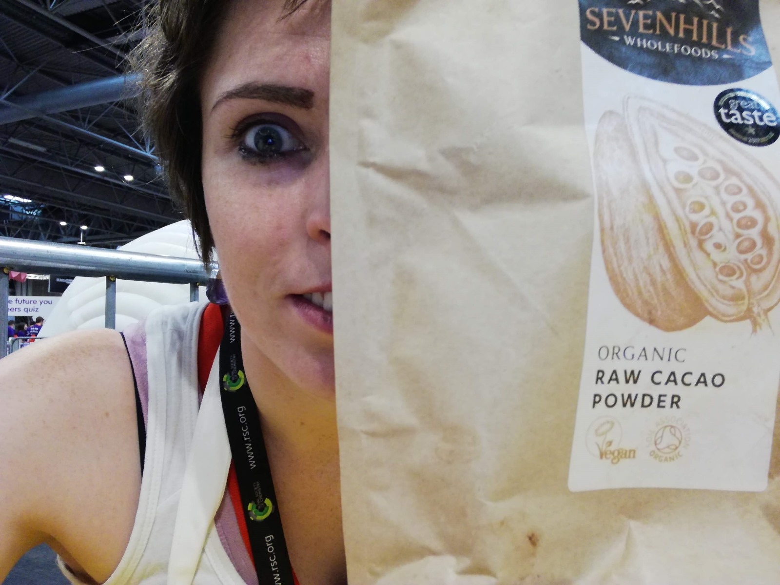 Rowena holding a bag of cacao powder